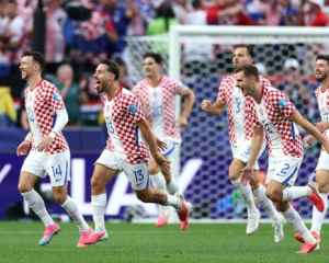 Nikola Vlasic scored a late header as Croatia booked their place in the World Cup last 32 with victory over already-qualified Ghana in Philadelphia.