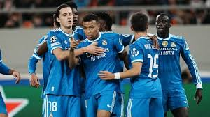 Kylian Mbappe scored four goals as Real Madrid edged out Olympiacos in a Champions League thriller.