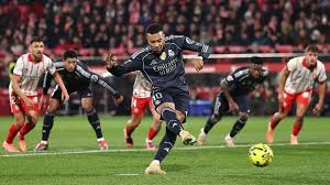 Kylian Mbappe's penalty rescued Real Madrid from defeat at Girona, but a point meant they missed the chance to move back to the top of La Liga.