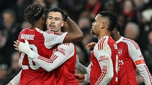 Arsenal scored four goals in the opening 30 minutes as they cruised past Wigan to reach the FA Cup fifth round for the first time in six years.