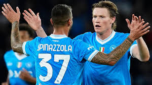 Scott McTominay and Kevin de Bruyne scored as defending champions Napoli beat title rivals Inter Milan and moved to the top of the Serie A table.