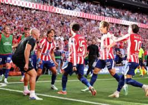 Atletico Madrid beat Real Madrid in a feisty derby to move above their rivals into second place in La Liga.
