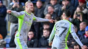 Erling Haaland scored twice to help Manchester City dispatch Crystal Palace and maintain the pressure on Premier League leaders Arsenal.