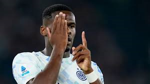 Ange-Yoan Bonny's early goal helped Inter Milan edge past Roma and go top of Serie A on goal difference.