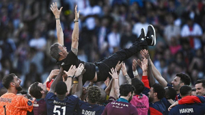 Manager Luis Enrique says Paris St-Germain are "motivated to try to finish the season unbeaten" after clinching a fourth straight Ligue 1 title.