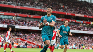 Arsenal's hopes of building momentum before their crucial Champions League tie with Paris St-Germain in midweek were hit as Bournemouth came from behind to win at Emirates Stadium and boost their own European ambitions.