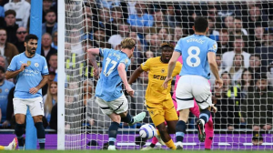 Kevin de Bruyne scored in his penultimate home game to edge Manchester City past Wolves and lift them to third place in the Premier League.