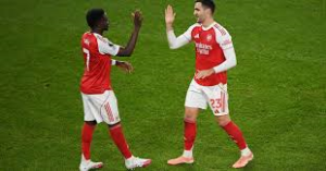 Mikel Merino and Bukayo Saka scored as Arsenal beat Brentford to restore their five point lead at the top of the Premier League table.