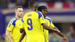 Anthony Elanga scored a second-half stunner to secure a last-32 spot for Sweden as they came from behind to earn a point against Japan.