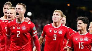 Denmark ended Greece's hopes of World Cup qualification with a dominant victory in Copenhagen - a result which seals at least a play-off place for Scotland.