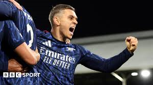Leandro Trossard's second-half goal was enough for Arsenal to overcome a stubborn Fulham and move three points clear at the top of the Premier League.