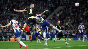 Erling Haaland scored twice as Manchester City began their Champions League campaign with a comfortable victory against Porto.