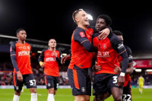 League One Luton Town survived a scare to beat National League side Forest Green Rovers 4-3 in the FA Cup first round.