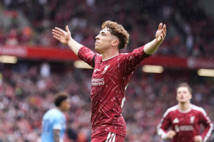 Victor Munoz marked his full debut with a goal to rescue a Premier League point for Liverpool at home to Nottingham Forest.
