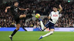 Dominic Solanke produced a stunning piece of improvisation as Tottenham came from two goals down to earn a point and deliver a serious setback to Manchester City's Premier League title hopes.