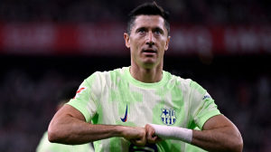 Robert Lewandowski scored twice as La Liga champions Barcelona wrapped up their domestic treble-winning season with a comfortable victory at Athletic Club.