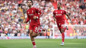 Dominik Szoboszlai's brilliant late free-kick gave Liverpool victory against Arsenal after a hard-fought meeting of the Premier League superpowers at Anfield.
