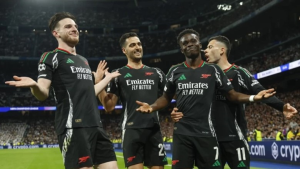 Bukayo Saka scored a goal and missed a penalty as Arsenal held off Real Madrid to reach the Champions League semi-finals in an incident-packed match at the Bernabeu.