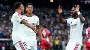 Real Madrid moved level on points with Barcelona at the top of La Liga after thrashing city rivals Rayo Vallecano at the Santiago Bernabeu.