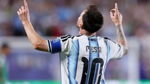 Lionel Messi became the World Cup's all-time record goalscorer as his double against Austria sent holders Argentina into the last 32.