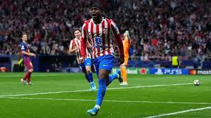 Atletico Madrid survived a valiant Barcelona fightback to progress to the Champions League semi-finals 3-2 on aggregate despite losing a thrilling quarter-final second leg 2-1 in Madrid.