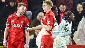 Aberdeen exited the Conference League without a win and a game to spare despite a spirited display in their defeat to leaders Strasbourg at Pittodrie.