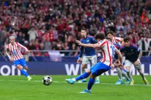 Arsenal and Atletico Madrid scored a penalty each in an incident-packed first-leg draw that leaves their Champions League semi-final in the balance.