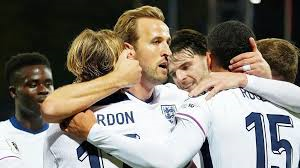 England confirmed their qualification for next summer's World Cup by overwhelming Latvia in Riga.