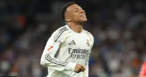 Kylian Mbappe and Vinicius Junior scored either side of half-time as Real Madrid cut Barcelona's lead at the top of La Liga to six points with a 2-1 win over relegation-threatened Alaves.