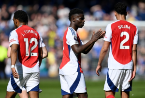 Arsenal's faint Premier League title hopes suffered a potentially fatal blow as they were held to a draw at Everton.