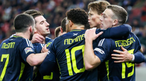 Scott McTominay's penalty moved Scotland closer to retaining their Nations League A status as they edged past Greece in the first leg of their play-off in Piraeus.