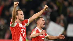 Harry Kane scored two second-half goals as Bayern Munich came from behind to beat Borussia Dortmund in a thrilling match and move 11 points clear at the top of the Bundesliga.