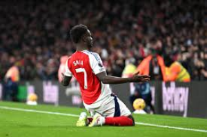 Saka 'ready to go' after three months out.