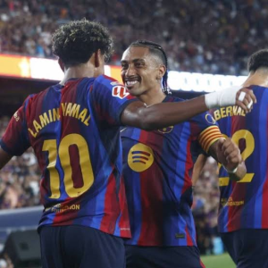 Raphinha and Lamine Yamal both scored twice as Barcelona beat Rayo Vallecano to make it three wins out of three in La Liga.