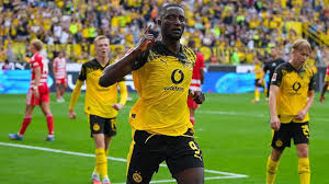 Serhou Guirassy scored either side of half-time as Borussia Dortmund beat Union Berlin to secure their first win of the season.