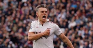 Leandro Trossard's late winner moved Arsenal a step closer to the Premier League title and left West Ham United deep in relegation trouble after a dramatic finale at the London Stadium.