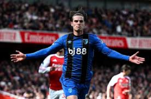 Arsenal's title hopes were dealt a major blow as Alex Scott's second-half strike gave Bournemouth victory at Emirates Stadium.