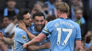 Kevin de Bruyne signed off from his last home game for Manchester City on a high, as they beat Bournemouth to close in on a place in the Champions League next season - and both sides finished with 10 men.
